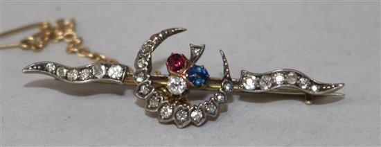 An early 20th century yellow metal, diamond and gem set crescent bar brooch, 49mm.